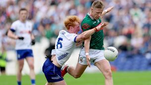 <p>ALL IN: Monaghan’s Ryan O’Toole tries to block the progress of Mayo's Ryan O’Donoghue. Pic: INPHO/James Crombie</p>