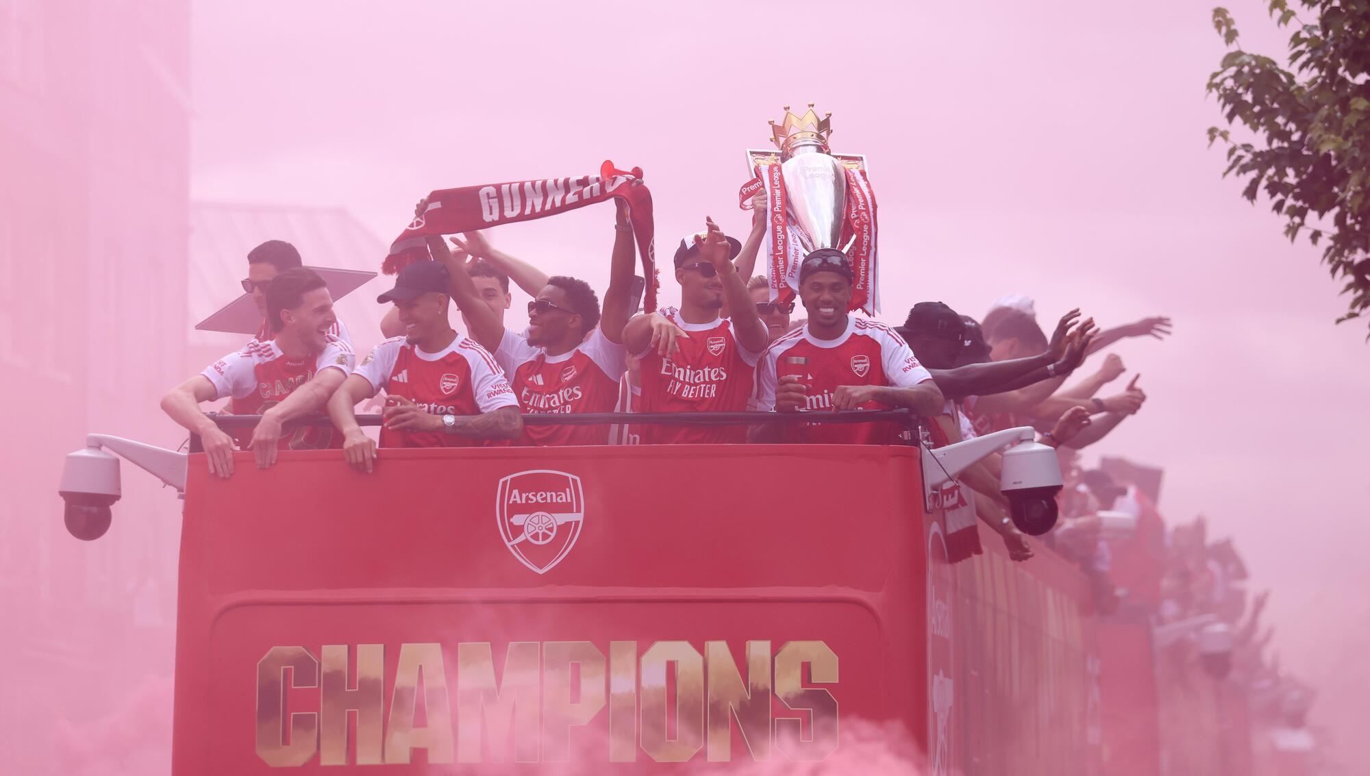 Arsenal put Champions League defeat behind them with open-top bus parade