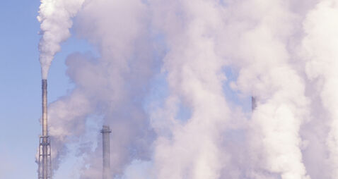 Pollution from smokestacks filling the air at the Boise Cascade Paper Plant in Rumford Maine