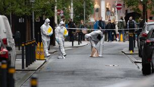 <p>Garda forensic officers at the scene of the stabbing. Picture: Damien Storan</p> <p>Garda forensic officers at the scene of the stabbing. Picture: Damien Storan</p>