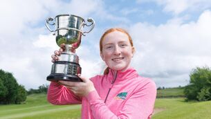 <p>CHAMPION: Ella Cantwell with the trophy after winning the championship. Pic: ©INPHO/Tom Maher.</p>