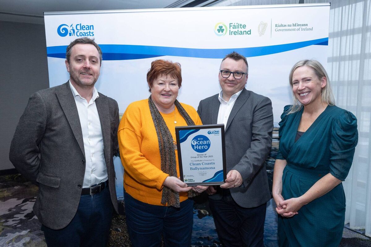 Members of the Clean Coasts Ballynamona environmental group receive their Ocean Hero award. Picture: Dylan Costello