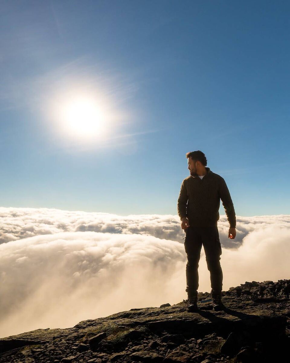 Joshua Nueva, whose social media posts feature the beauty of nature and promote the importance of protecting it; pictured here on Carrauntoohill, Co Kerry. 
