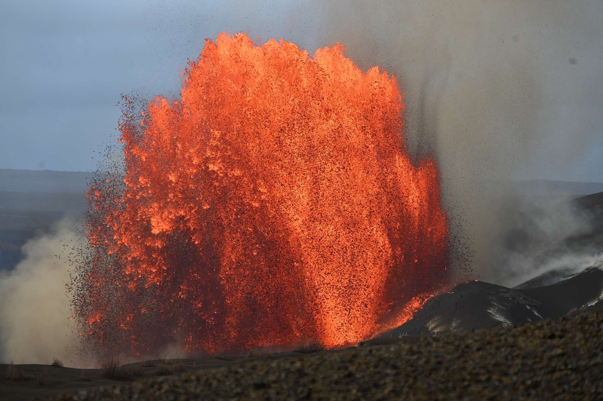 Tourists watch latest eruption as Hawaii’s Kilauea volcano sets lava record