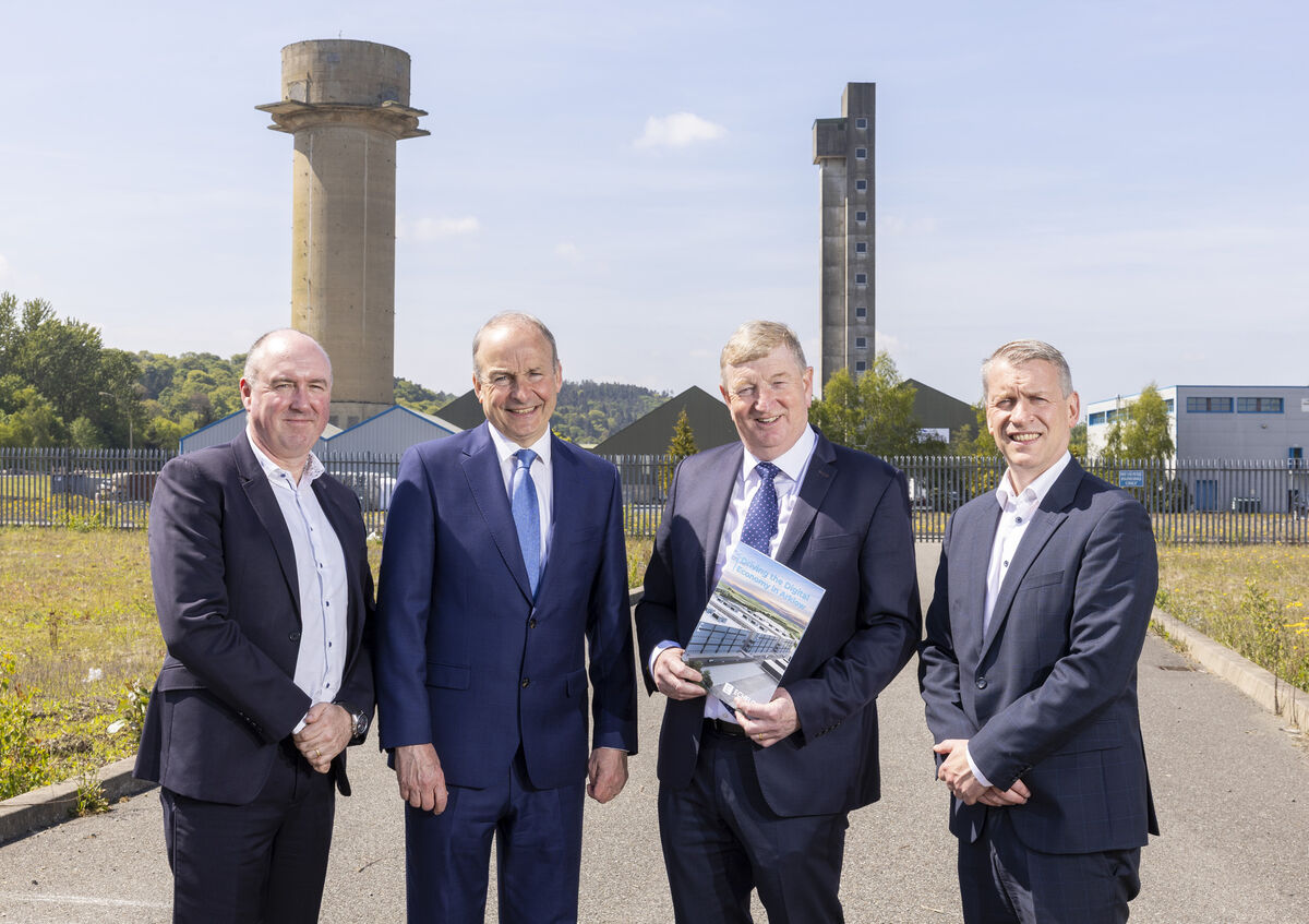 (Left to right) Niall Molloy, CEO of Echelon Data Centres, Taoiseach Micheál Martin, Senator Pat Casey and Graeme McWilliams, COO at the official launch of the Echelon Data Centres campuses last year. A recent Friends of the Earth report shows household energy bills skyrocket largely due to data centre demand. Photo: Peter Houlihan (Left to right) Niall Molloy, CEO of Echelon Data Centres, Taoiseach Micheál Martin, Senator Pat Casey and Graeme McWilliams, COO at the official launch of the Echelon Data Centres campuses last year. A recent Friends of the Earth report shows household energy bills skyrocket largely due to data centre demand. Photo: Peter Houlihan