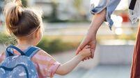 iStock-1416623454.jpg Unrecognizable Daughter Being Taken To School By Her Mother