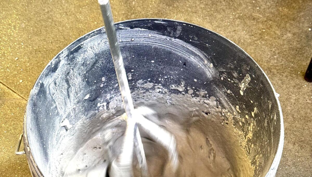 A paddle mixer and attachment for the drill to mix grout. A paddle mixer and attachment for the drill to mix grout.