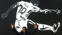 GettyImages-1245378278.jpg TOPSHOT-FBL-BRAZIL-PELE-EXHIBITION