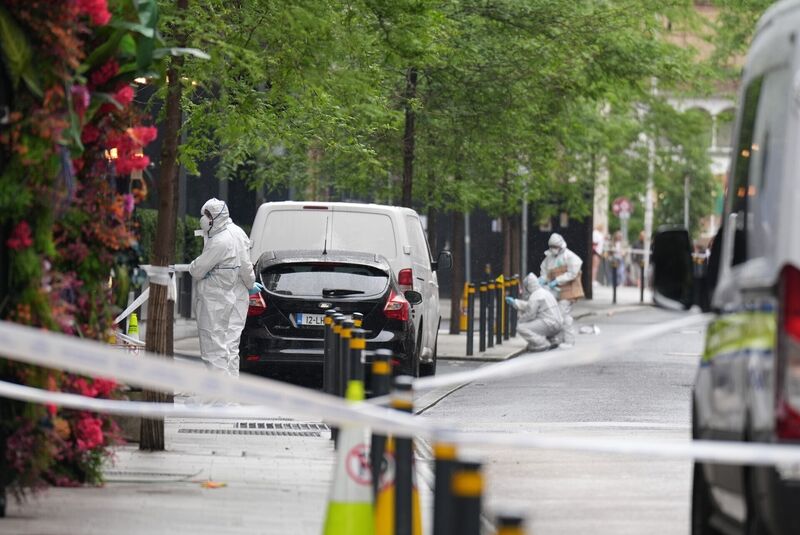 Forensic officers on Clarendon St, Dublin, after the incident. Picture: Niall Carson/PA Wire Forensic officers on Clarendon St, Dublin, after the incident. Picture: Niall Carson/PA Wire