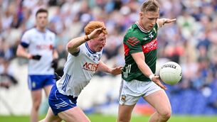 <p>BATTLEGROUND: Ryan O'Donoghue of Mayo in action against Ryan O'Toole of Monaghan. Pic: Philip Fitzpatrick/Sportsfile</p>