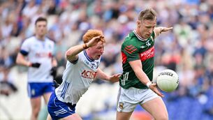 <p>BATTLEGROUND: Ryan O'Donoghue of Mayo in action against Ryan O'Toole of Monaghan. Pic: Philip Fitzpatrick/Sportsfile</p>