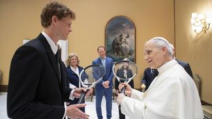 <p>RELIGIOUS FERVOUR: World tennis champion Jannik Sinner gifts a tennis racket to Pope Leo XIV, during a private meeting in the Vatican. According to the Holy See Press Office, the audience between the Pope and the 23-year-old athlete included Mr. Sinner's family and the President of the Italian Tennis Federation, Alberto Binaghi. Pic: Vatican Media </p>