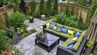 Small downtown Toronto urban back yard garden in summer.