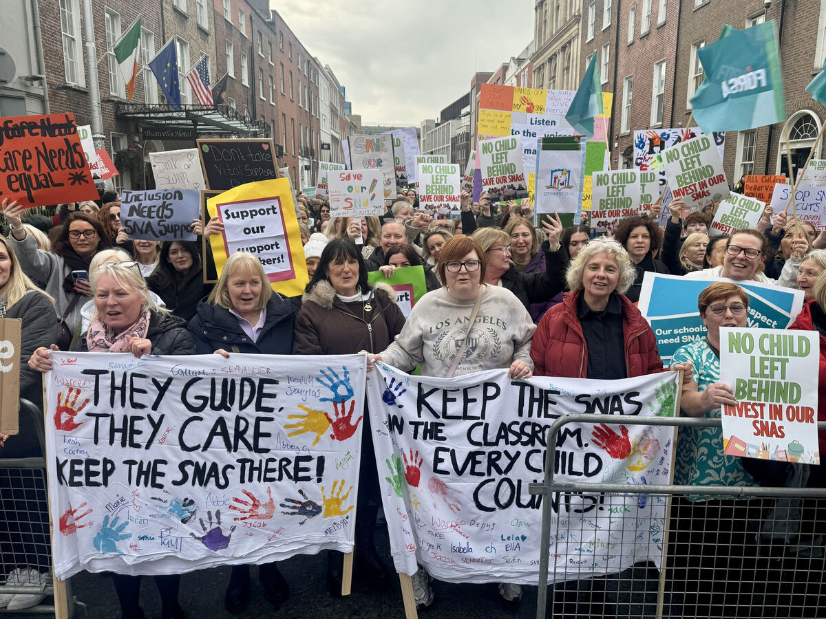Natalie Murphy and her daughter Lily from Dublin joined special needs assistants in one of the protests at Leinster House in February. Picture: PA Natalie Murphy and her daughter Lily from Dublin joined special needs assistants in one of the protests at Leinster House in February. Picture: PA