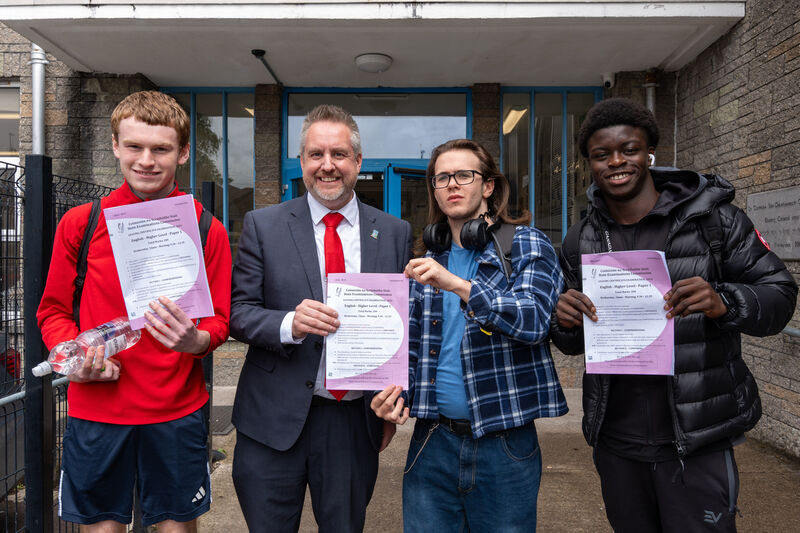 School principal Aaron Wolfe with students Ronan Kenny, Seán Varian O’Driscoll, and John Paul Irabor at Coláiste Éamann Rís in Cork who were happy with their first paper of this year's Leaving Certificate exams. Picture: Noel Sweeney School principal Aaron Wolfe with students Ronan Kenny, Seán Varian O’Driscoll, and John Paul Irabor at Coláiste Éamann Rís in Cork who were happy with their first paper of this year's Leaving Certificate exams. Picture: Noel Sweeney