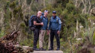 <p>Ray Goggins, Jay Duffy and Keith Duffy in the Rwenzori Mountains in Uganda. Picture: RTE.</p>