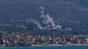 Smoke rises from an Israeli airstrike that hit Qlaileh village in Lebanon on Tuesday (Mohammed Zaatari/AP)