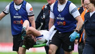 <p>Monaghan’s Bobby McCaul leaves the field injured. Pic: James Crombie/Inpho</p>