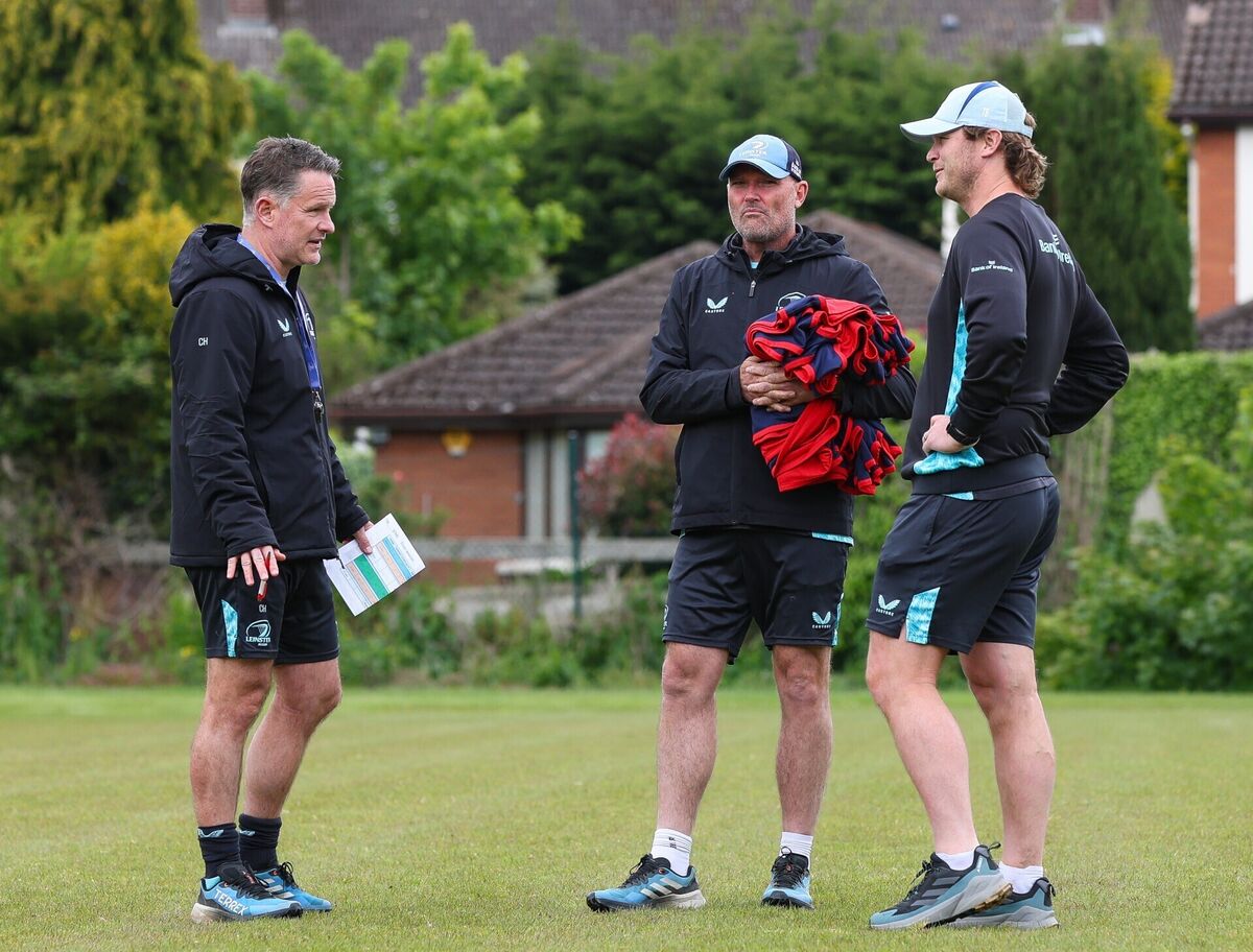 Head of Athletic Development Charlie Higgins and assistant attack coach Tyler Bleyendaal talk shop with Nienaber at training. Pic: Grace Halton/Inpho