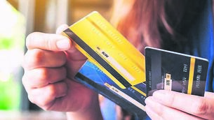 <p>Fraudsters in shops and crowded areas are using portable payment devices to tap credit cards in customers’ pockets and handbags. File picture</p>