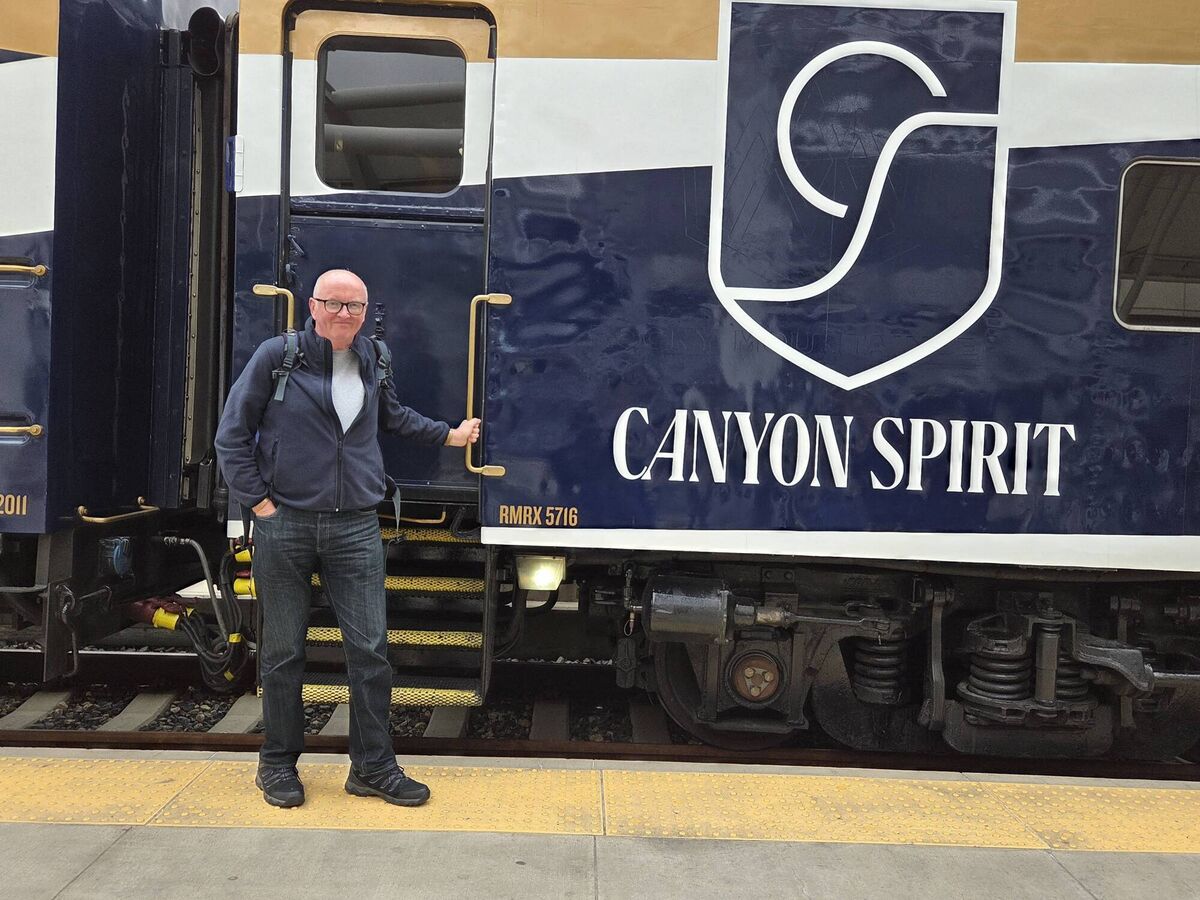 The Canyon Spirit train and it's driver at the station platform