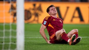 <p>BLIGHTED: Evan Ferguson of AS Roma is injured during the Serie A match in January. Picture: Paolo Bruno/Getty Images</p>
