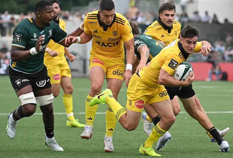 La Rochelle's French scrum-half Nolann Le Garrec, right, scores a try during the Top14 match against Montauban at Stade Sapiac. Picture: Matthieu Rondel/AFP via Getty Images La Rochelle's French scrum-half Nolann Le Garrec, right, scores a try during the Top14 match against Montauban at Stade Sapiac. Picture: Matthieu Rondel/AFP via Getty Images
