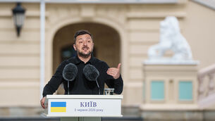 <p>Ukraine’s President Volodymyr Zelensky speaks to journalists during a joint press conference with Nato in Kyiv (Evgeniy Maloletka/AP)</p>