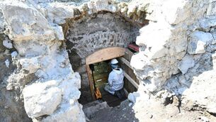 <p>Tuam Mother and Baby Home Update. A member of the Forensic excavation team working in the subterranean vaulted structure. Credit ODAIT</p>