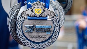 <p>The name Ellen, written inside a yellow heart, appeared on all 2026 Analog Devices Cork City Marathon finisher medals. Picture: Chani Anderson</p>