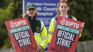 <p>Paramedics Aileen McClean (left) and Loughran on the picket line outside Dundalk Ambulance Station as members of Siptu and Unite union paramedics in the National Ambulance Service go on strike. Picture: PA</p>