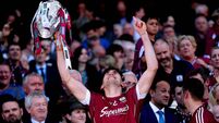 Jason Flynn lifts the Liam McCarthy cup 3/9/2017