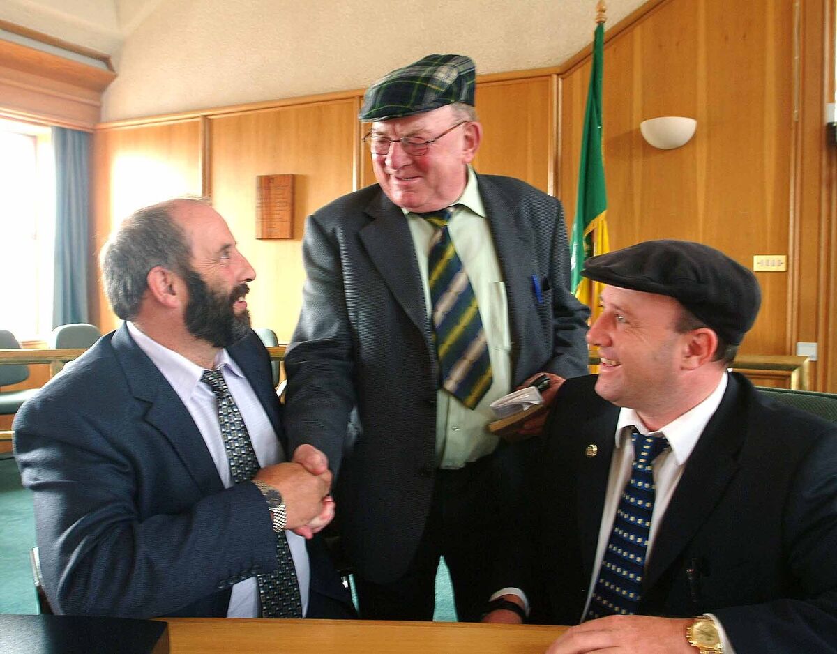 2003: Then TD Jackie Healy-Rae, centre, congratulates his son Danny on his co-option to the Killarney seat on Kerry County Council vacated by Jackie due to the end of the dual mandate. Danny's brother Michael, right, represented Killorglin on the council. The brothers went on to be elected TDs for Kerry. File picture: Don MacMonagle