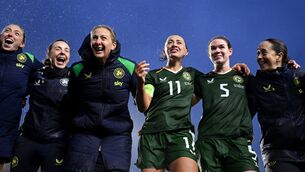 <p>Republic of Ireland players and staff, including head coach Carla Ward and captain Katie McCabe celebrate. Pic: Stephen McCarthy/Sportsfile</p>
