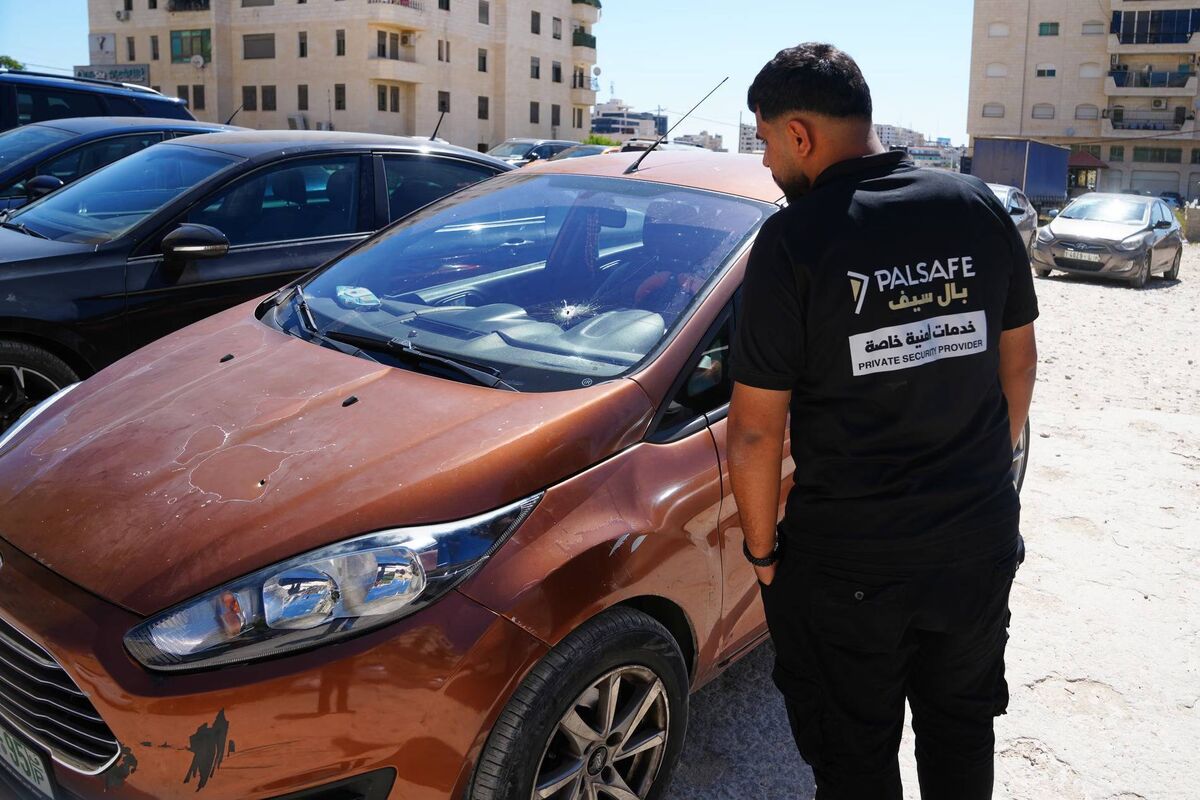 The family car that Sam Fahd Abu Haikal was travelling in when he was hit by Israeli gunfire in Hebron on Friday. Picture: Mahmoud Illean/AP The family car that Sam Fahd Abu Haikal was travelling in when he was hit by Israeli gunfire in Hebron on Friday. Picture: Mahmoud Illean/AP