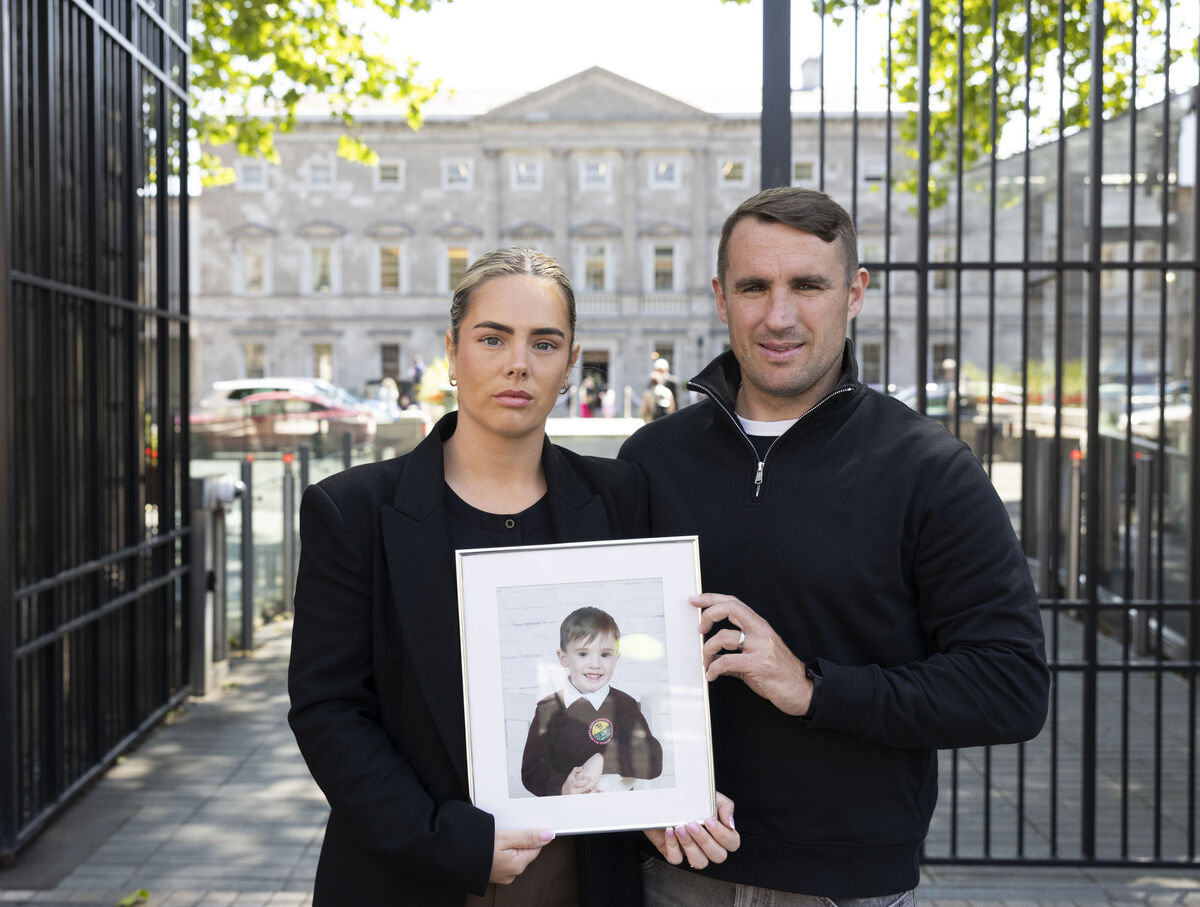 Una Ennis and husband Kenneth with a picture of their son Archie outside Leinster House last year, calling for access to Givinostat. Picture: Sam Boal/Collins 