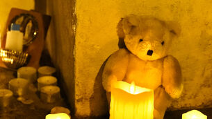 <p>Candles and tributes left following a vigil held outside Gaelscoil Cholaiste Mhuire school (Niall Carson/PA)</p> <p>Candles and tributes left following a vigil held outside Gaelscoil Cholaiste Mhuire school (Niall Carson/PA)</p>