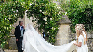 <p>Bride Harriet Sperling and her bridesmaids Georgina Sperling, Savannah Phillips and Isla Phillips arriving for her wedding to Peter Phillips (Ben Birchall/PA)</p>