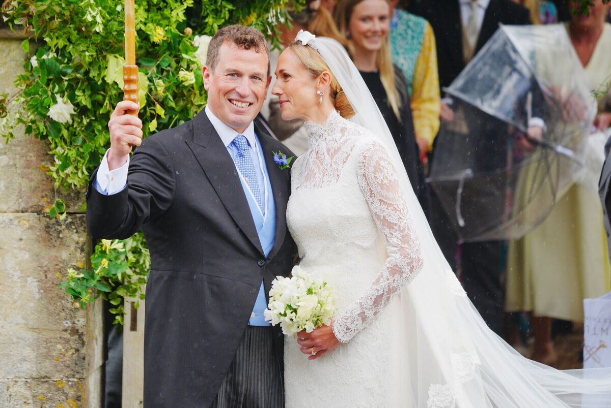 Harriet Sperling and Peter Phillips leave their wedding ceremony. Picture: Ben Birchall/PA Wire Harriet Sperling and Peter Phillips leave their wedding ceremony. Picture: Ben Birchall/PA Wire