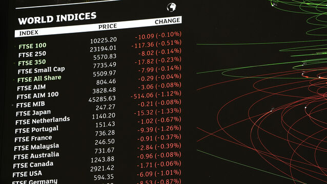 The UK’s FTSE 100 was down about 0.3% in early trading (Jonathan Brady/PA)