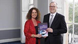 <p>Dr Roisín Murphy from TU Dublin, the author of ‘Employment Outlook for the Surveying Profession 2026 – 2029 with new SCSI president Tomás Kelly. Picture: Conor McCabe </p> <p>Dr Roisín Murphy from TU Dublin, the author of ‘Employment Outlook for the Surveying Profession 2026 – 2029 with new SCSI president Tomás Kelly. Picture: Conor McCabe </p>