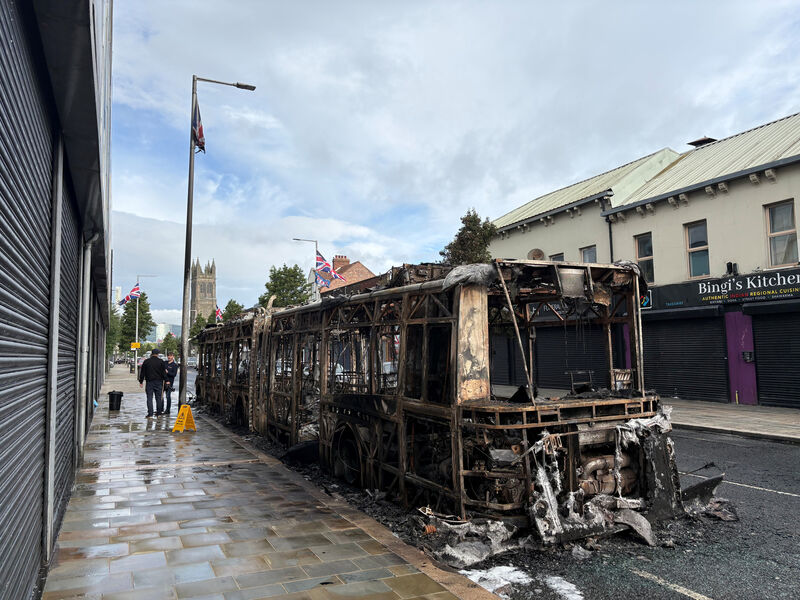A burned-out Glider bus on Newtownards Road in east Belfast after violence erupted on Tuesday (PA) A burned-out Glider bus on Newtownards Road in east Belfast after violence erupted on Tuesday (PA)