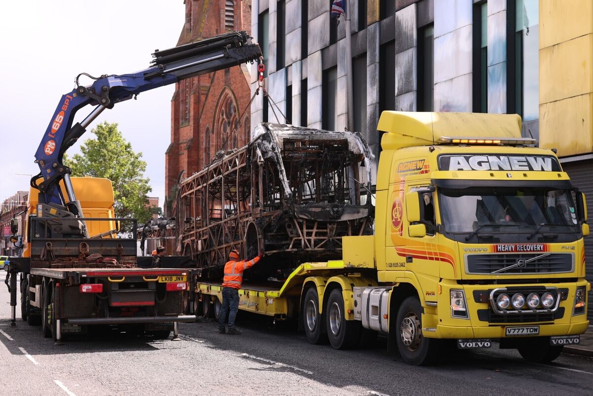 A Glider bus, on the Newtownards Road in east Belfast is removed, after it was set on fire during an anti-immigration demonstration organised in response to Monday night's stabbing attack in the city. Picture: Liam McBurney/PA Wire A Glider bus, on the Newtownards Road in east Belfast is removed, after it was set on fire during an anti-immigration demonstration organised in response to Monday night's stabbing attack in the city. Picture: Liam McBurney/PA Wire