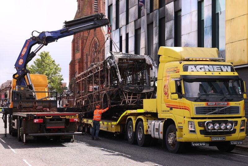A Glider bus, on the Newtownards Road in east Belfast is removed, after it was set on fire during an anti-immigration demonstration organised in response to Monday night's stabbing attack in the city. Picture: Liam McBurney/PA Wire A Glider bus, on the Newtownards Road in east Belfast is removed, after it was set on fire during an anti-immigration demonstration organised in response to Monday night's stabbing attack in the city. Picture: Liam McBurney/PA Wire