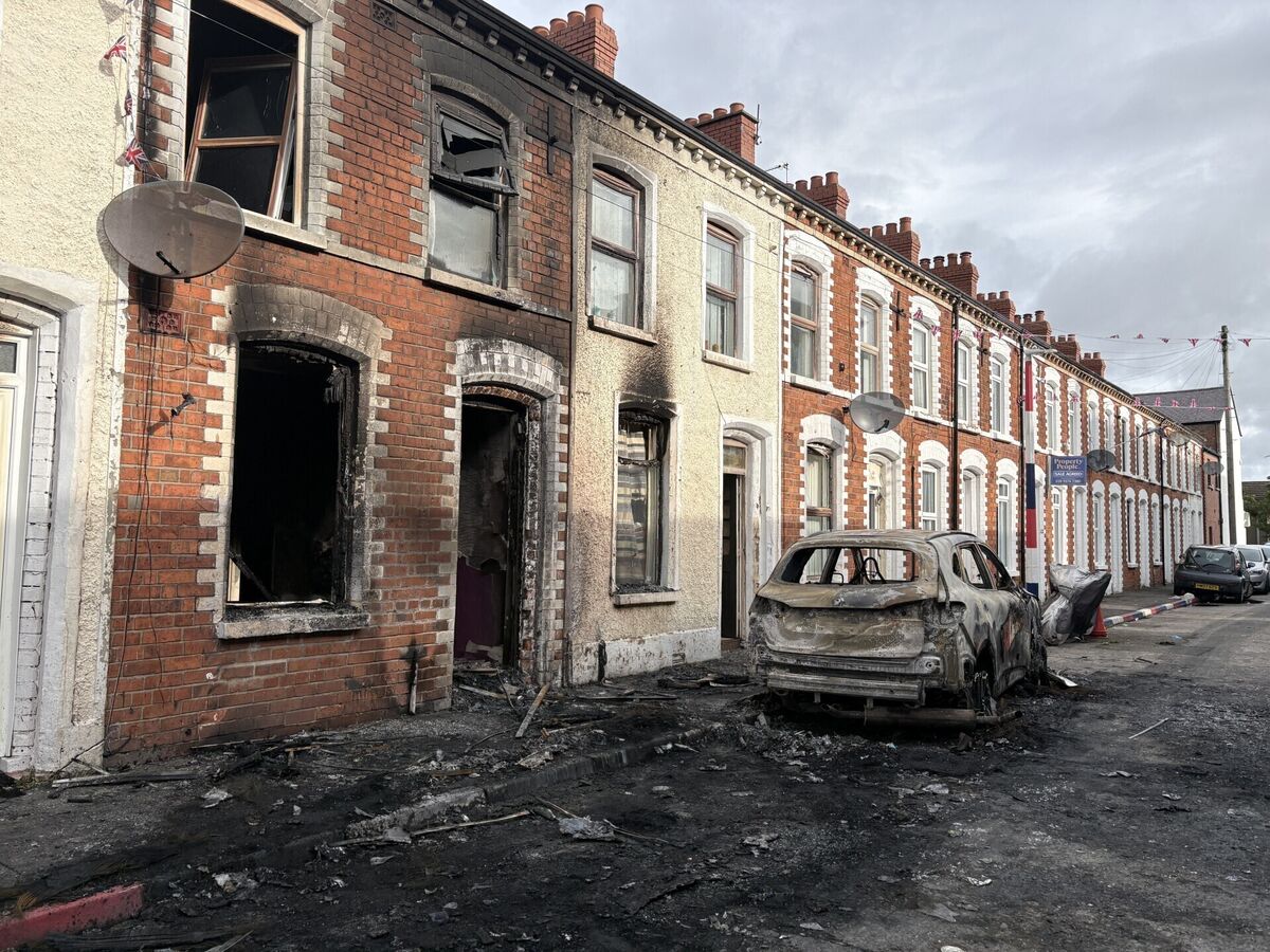 Burned out cars and houses on Lendrick Street in east Belfast after violence erupted on Tuesday night. Picture: PA Wire Burned out cars and houses on Lendrick Street in east Belfast after violence erupted on Tuesday night. Picture: PA Wire