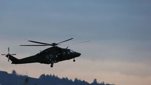 <p>The Defence Forces said an exercise included Air Corps helicopter crews successfully firing upon remotely controlled aircraft (Brian lawless/PA)</p>
