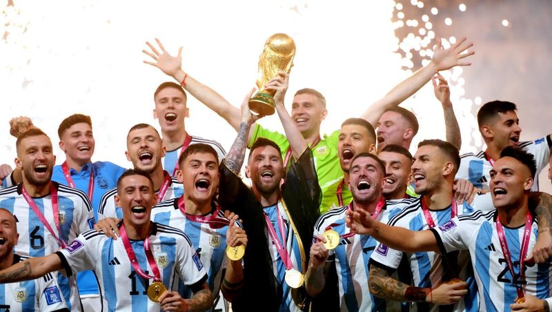 Lionel Messi with the FIFA World Cup. Pic: Nick Potts/PA Wire