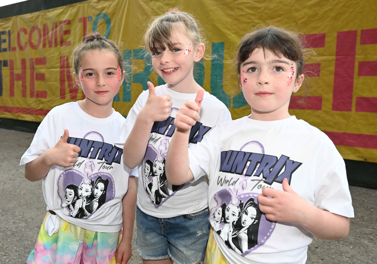 Freya Browne, centre, with her cousins Leila and Rosie Kinahan from Douglas arriving for the K Pop Forever! Tribute at Live At The Marquee. Picture: Eddie O'Hare