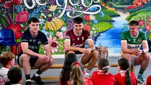 <p>Pupils of Scoil Chroí Íosa, Blarney, during an interview session with, from left, Eddie Gibbons of Dublin, Aaron Niland of Galway and Killian Sampson of Offaly. Pic: Brendan Moran/Sportsfile</p>