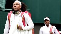 Serena defeats big sister Venus to keep Grand Slam hopes on track